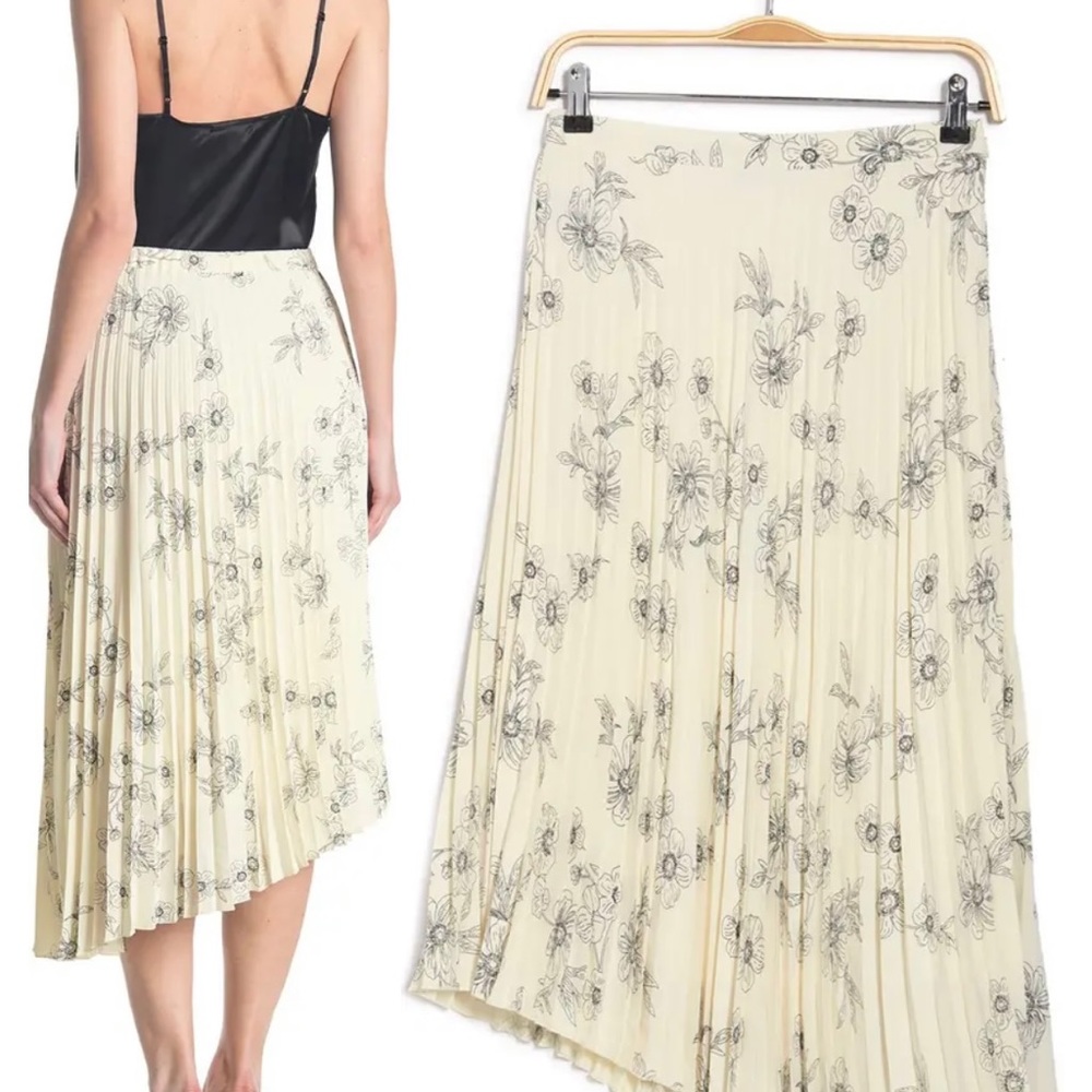 Sanctuary brand. Cream colored with black flower detailing